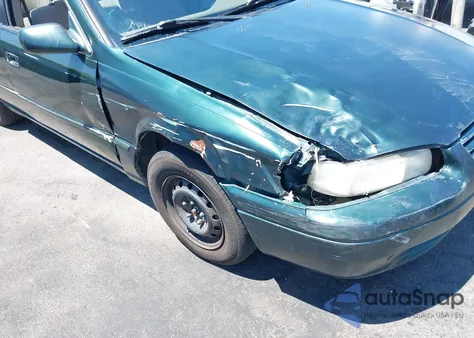 1999 Toyota Camry Le from USA, damaged, VIN 4T1BG22KXXU888043